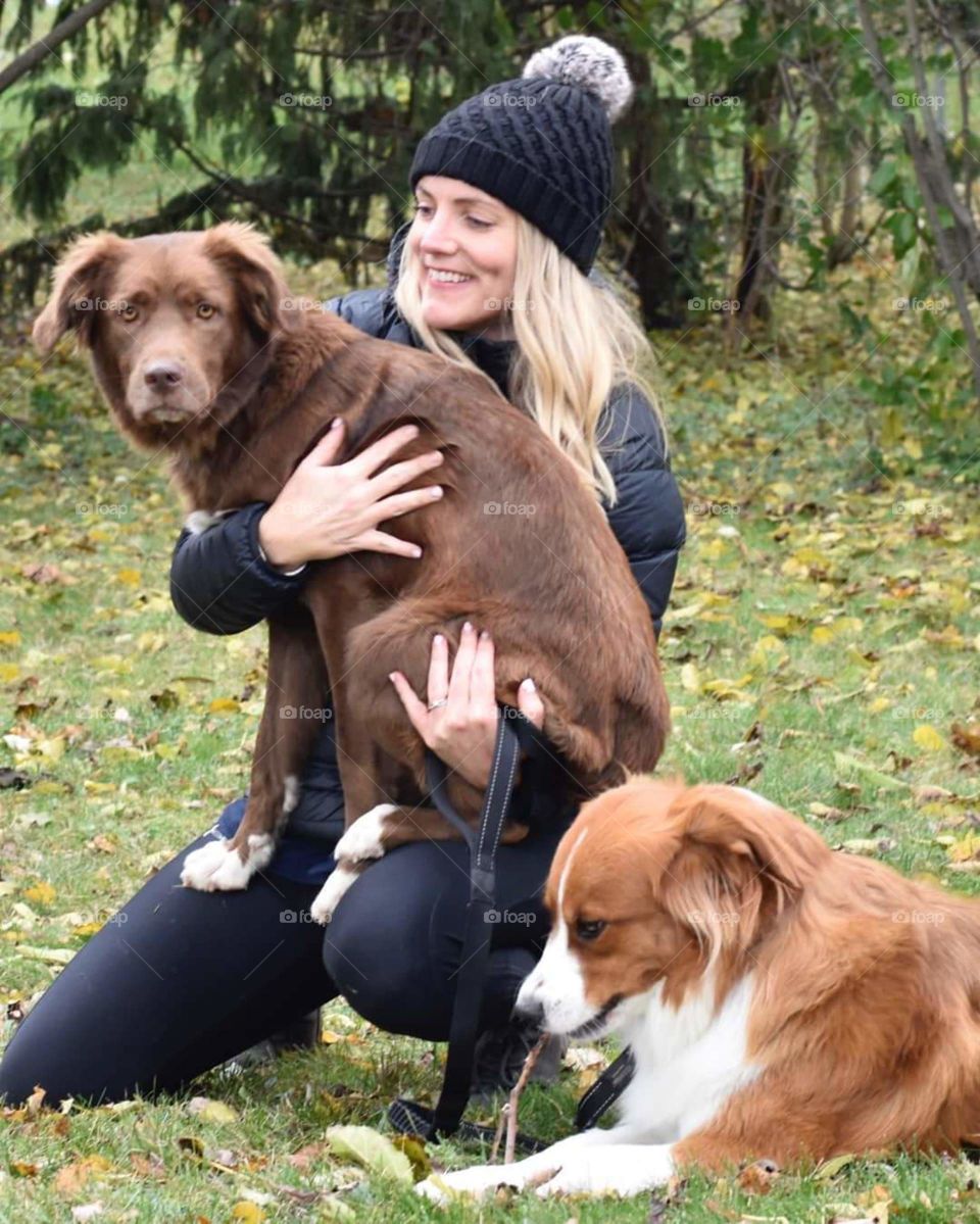 woman and her two beautiful dogs