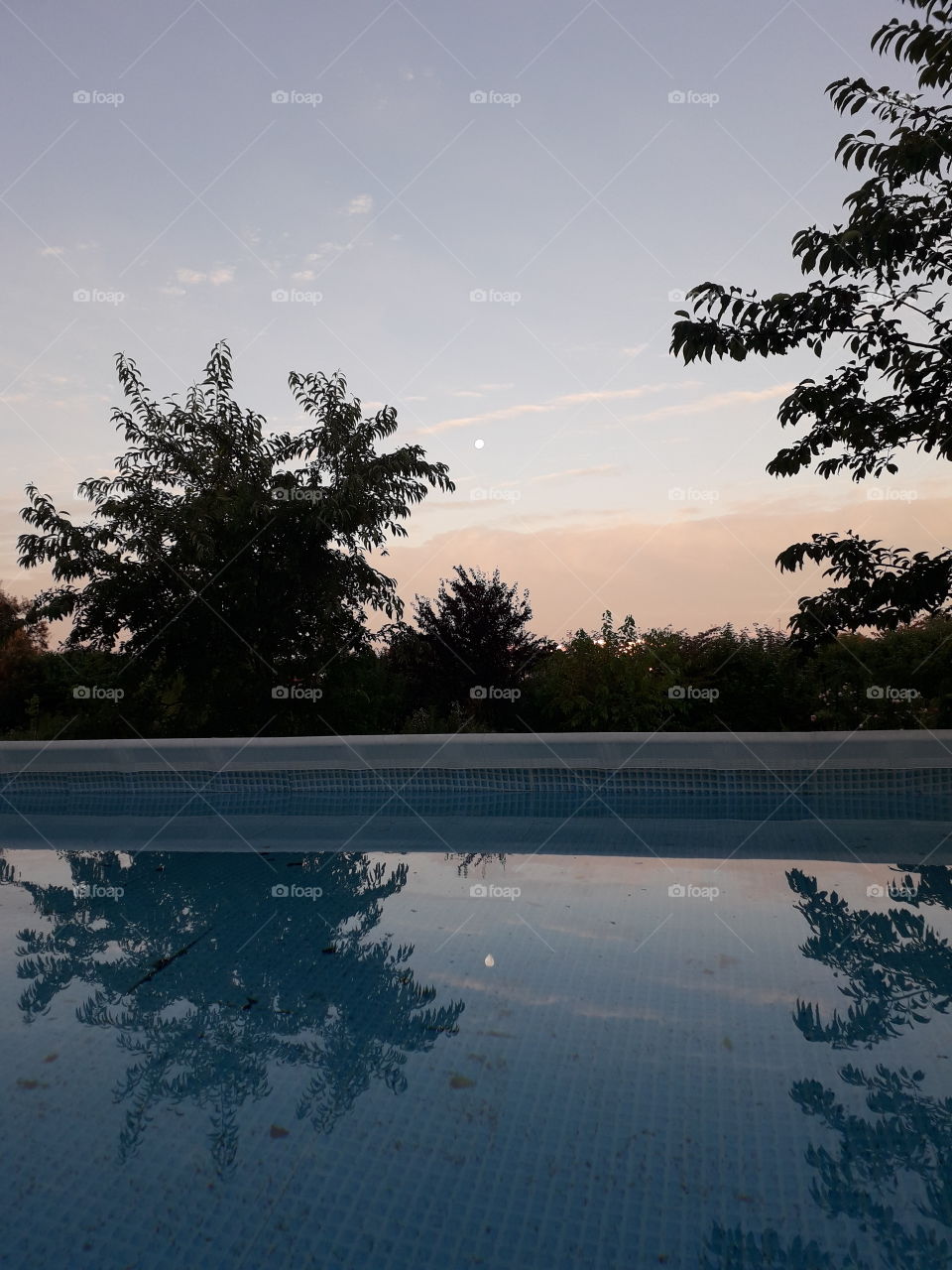 moon's reflection at sunrise