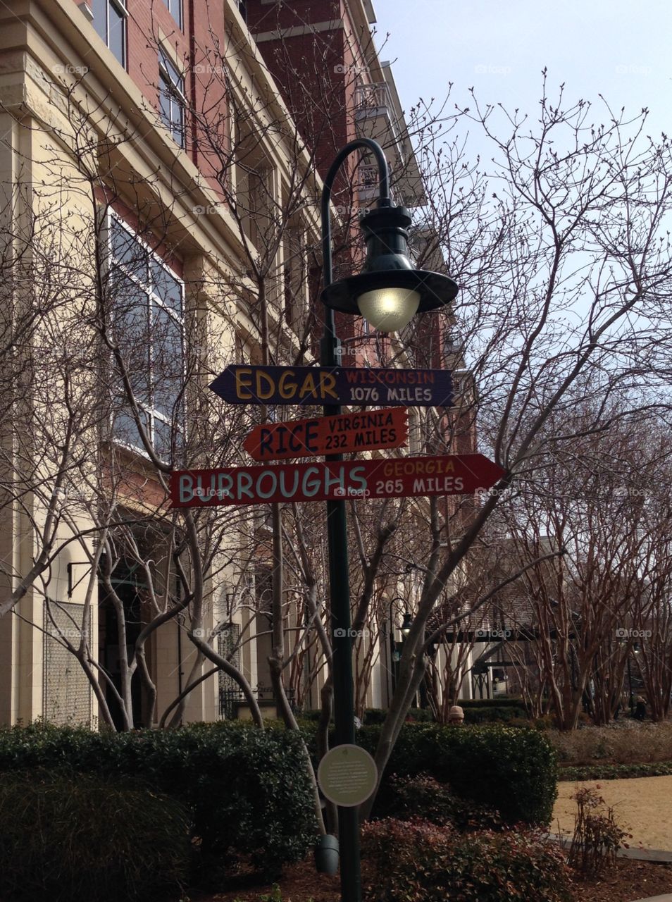 Which way?. Directional signs I came upon in downtown Charlotte, N.C.   Love the eclectic feel!