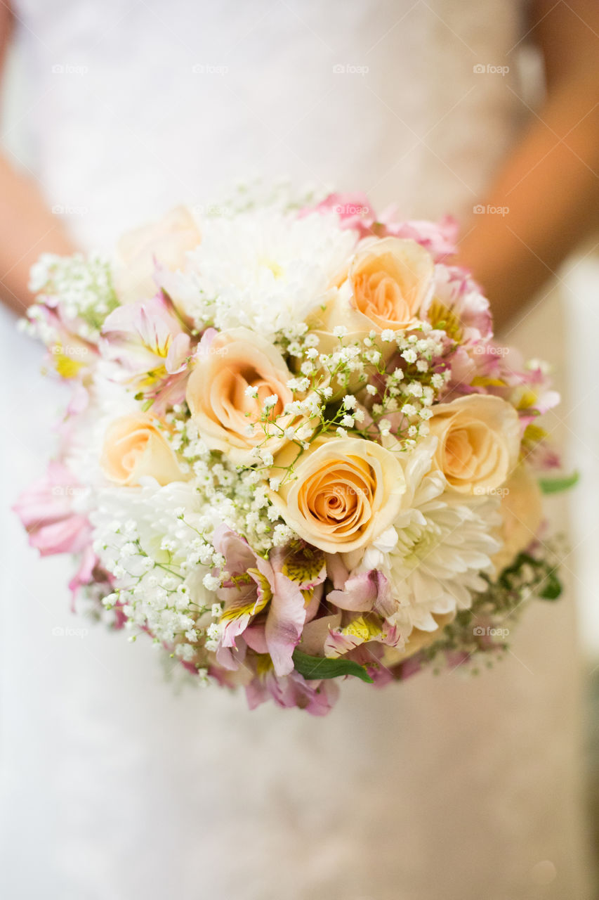 Bride holding flowers 