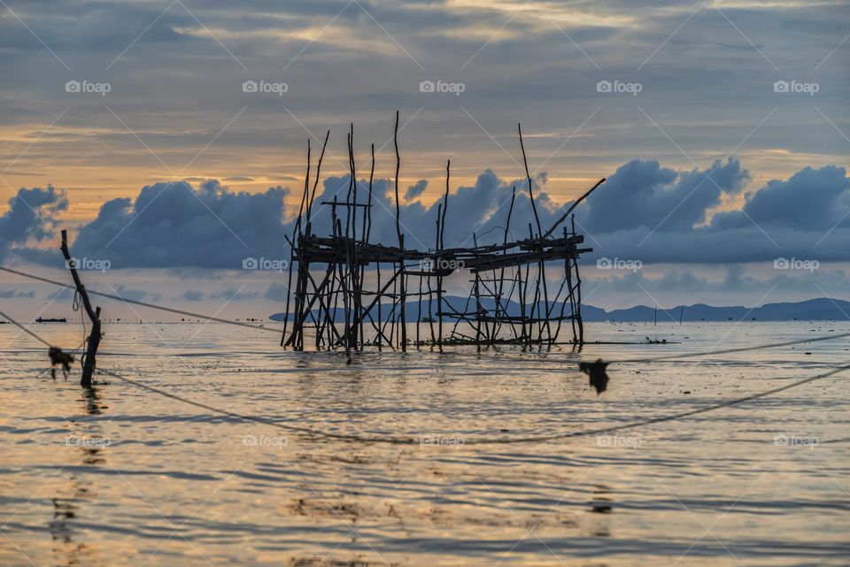 Silhouette of fish trap at Pakpra, Phatthalung province Thailand