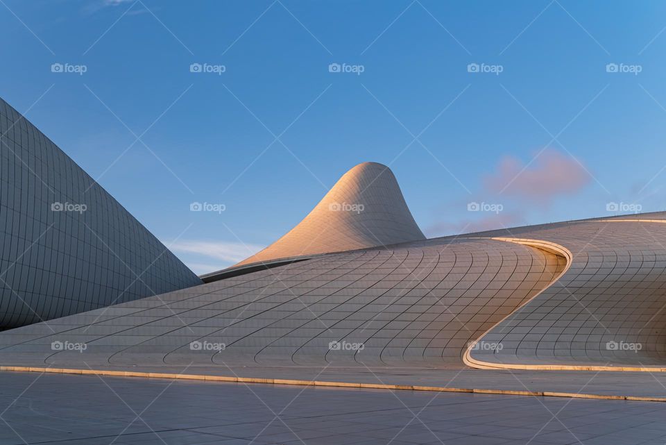 Baku, Azerbaijan - February 4, 2020: Abstract design of the Heydar Aliyev Center landmark in Baku Azerbaijan designed by Zaha Hadid that serves as a cultural and conference center, library and museum.