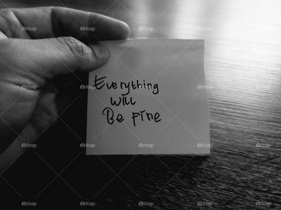 Motivational quotes on a small piece of paper