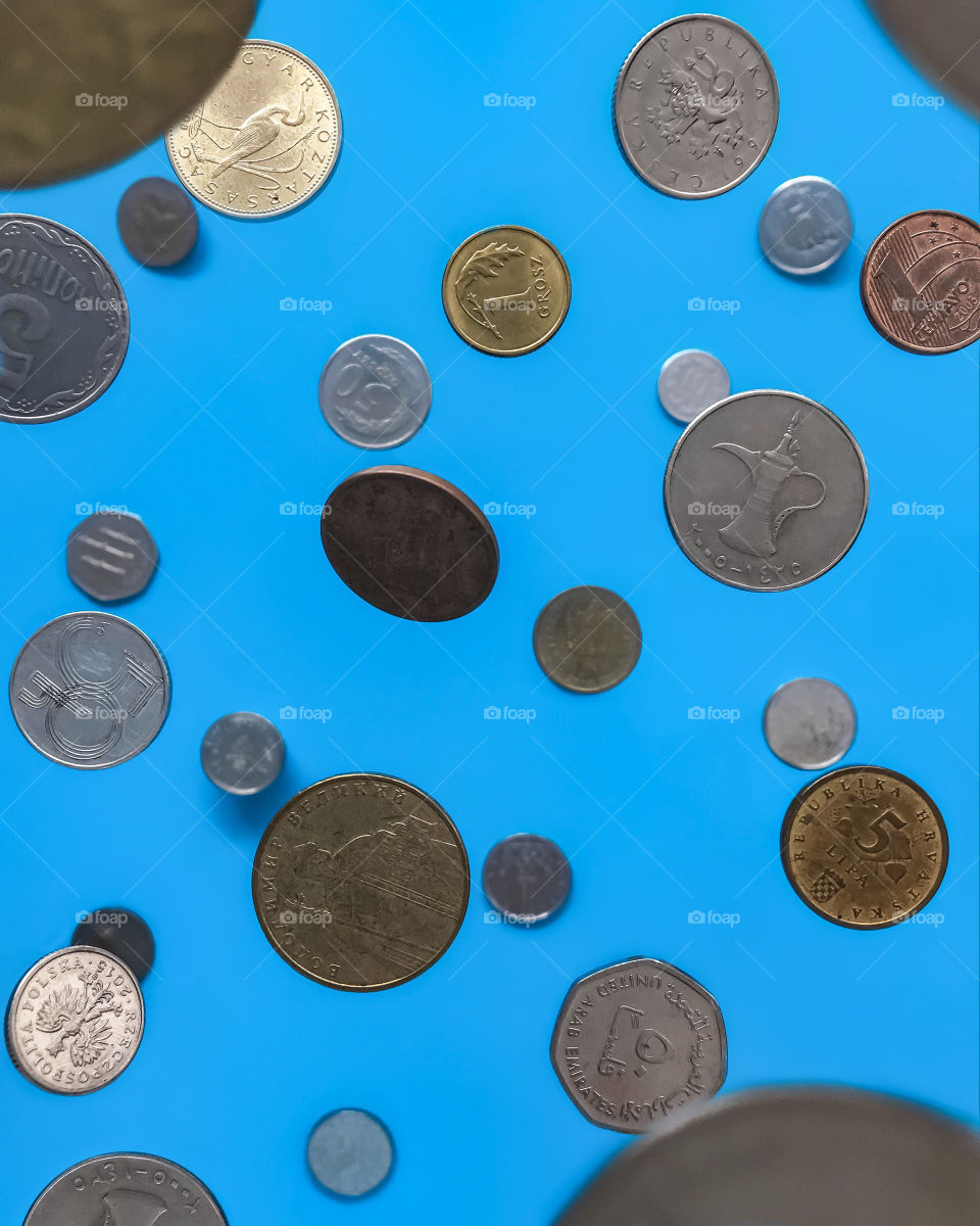 Gold and silver falling coins, money of the world