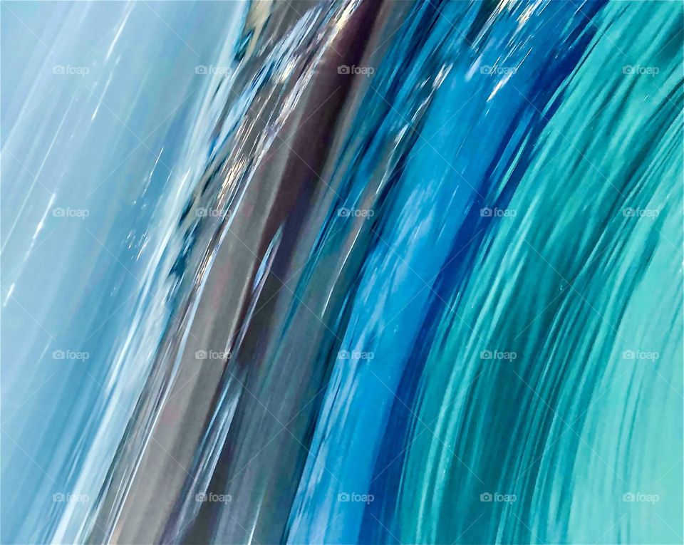 Abstract image of water in a swimming pool taken as the camera rotates