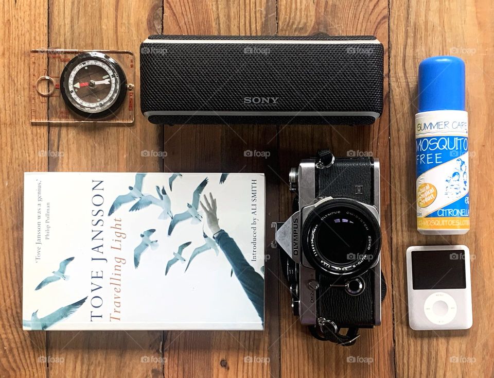 Travelling Light - with camera, iPod & speaker, compass, bug spray and a good book.