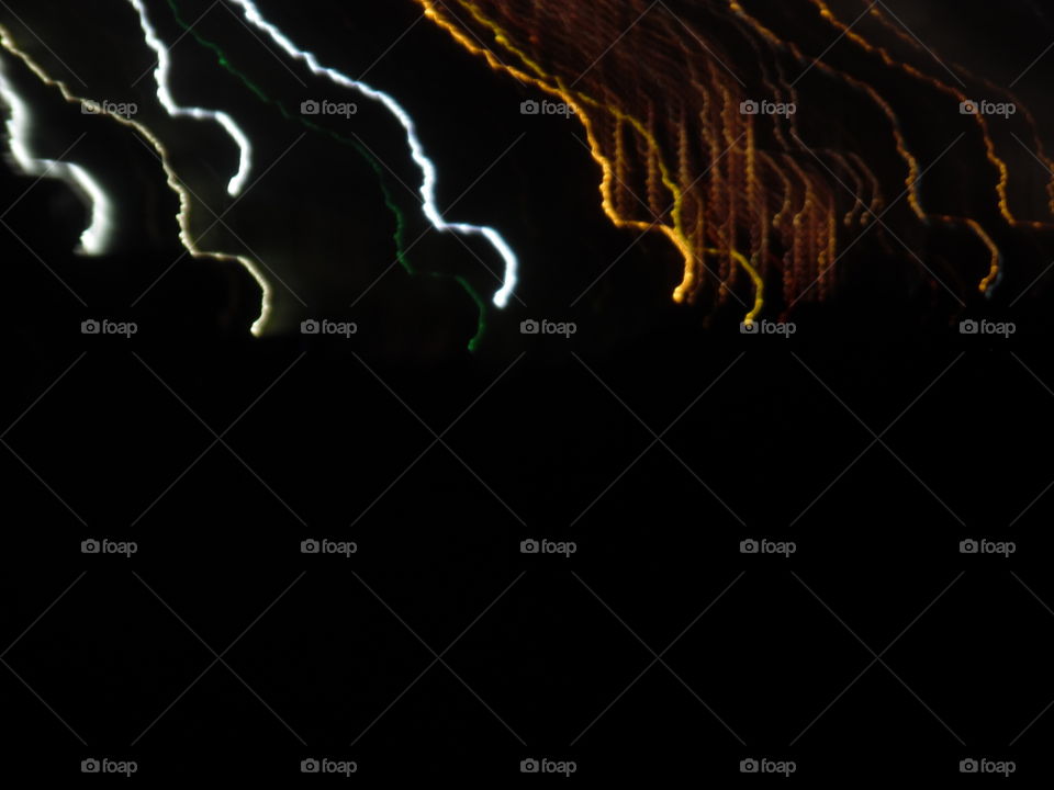 strings attached from heaven. This is a good picture of a light show that I took while visiting the deep south of Texas