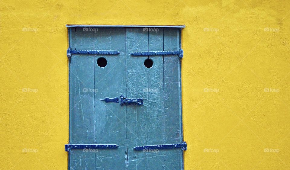 Photo of a house with an old door