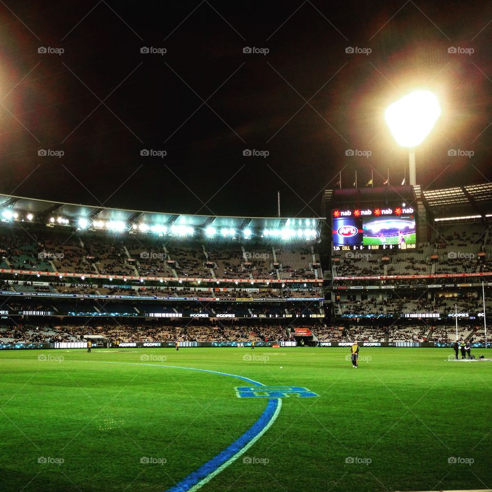 Waiting for the game to begin at the Melbourne Cricket Ground, Australia. 