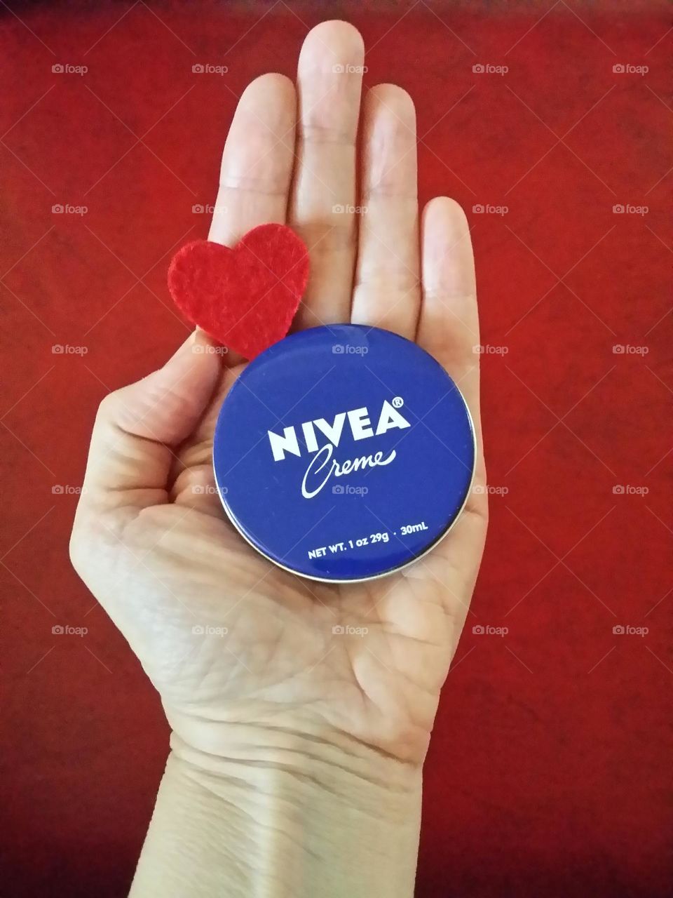 Nivea Cream Beauty Product in Hand