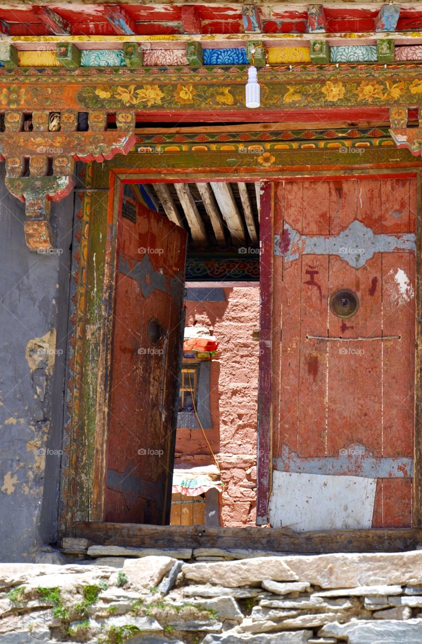 Wooden door in Tibetan monastery 