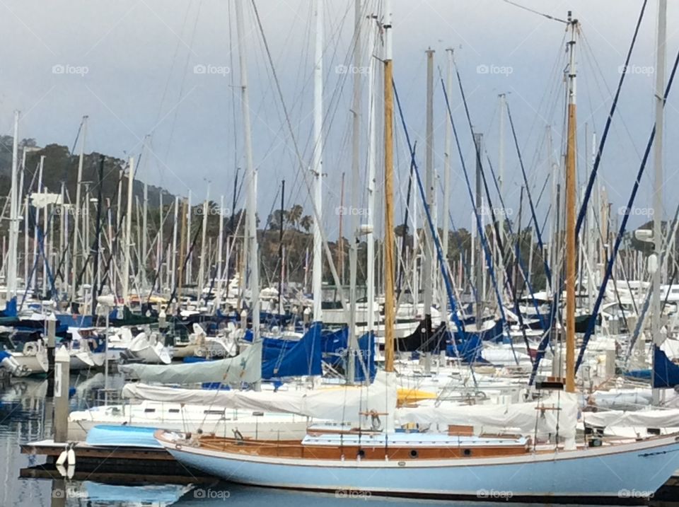 Blue sky sailing. Do sailboats Santa Barbara Harbor