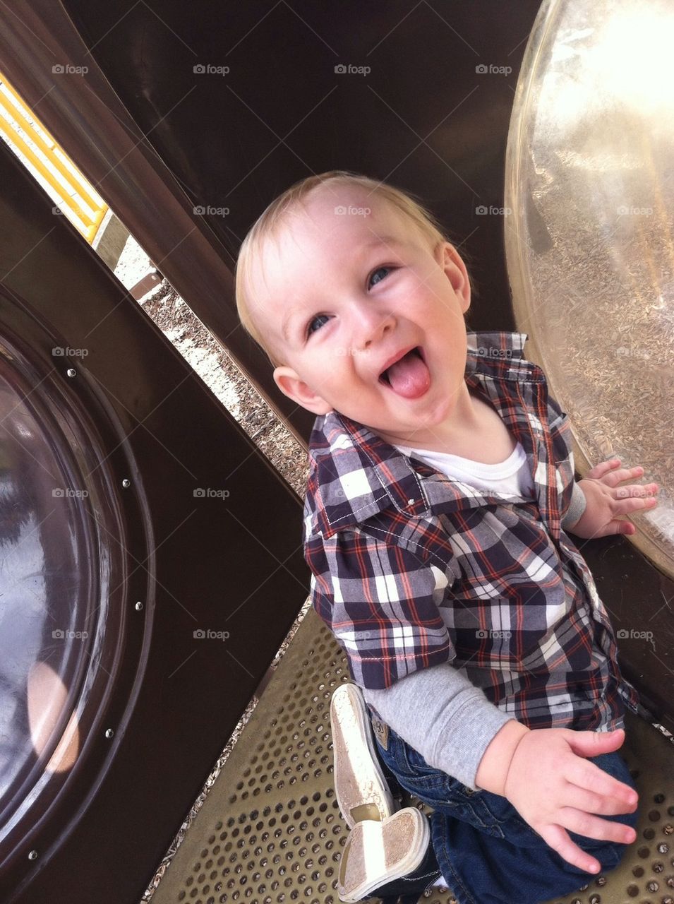 My son playing on a playground