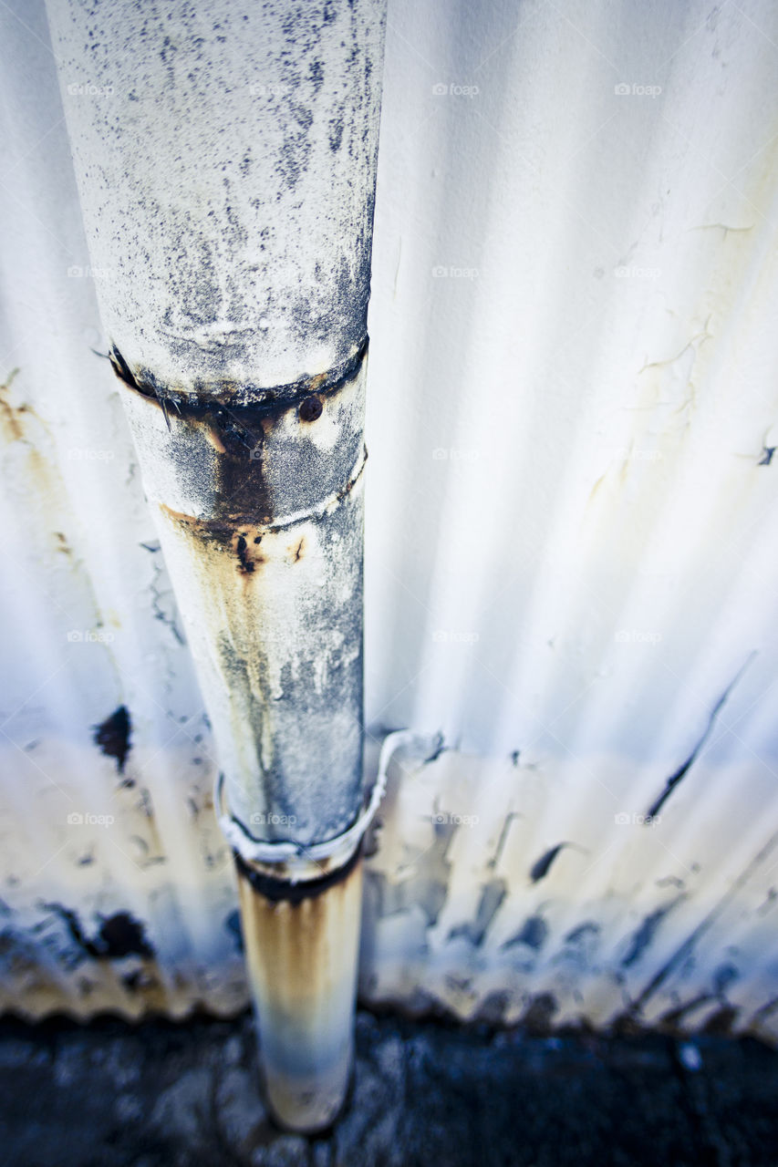 Urban Decay; blue rusty pipe