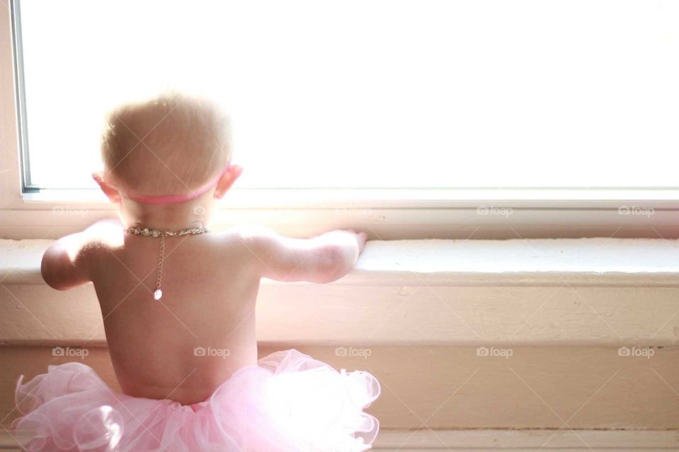 Toddler in a pink tutu ballerina