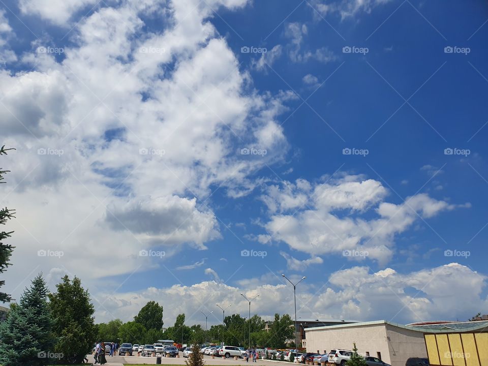 parking lot in the park and cloudy sky