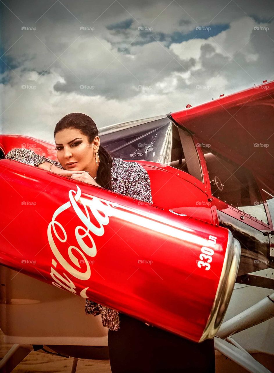 coca cola. girl. airplane