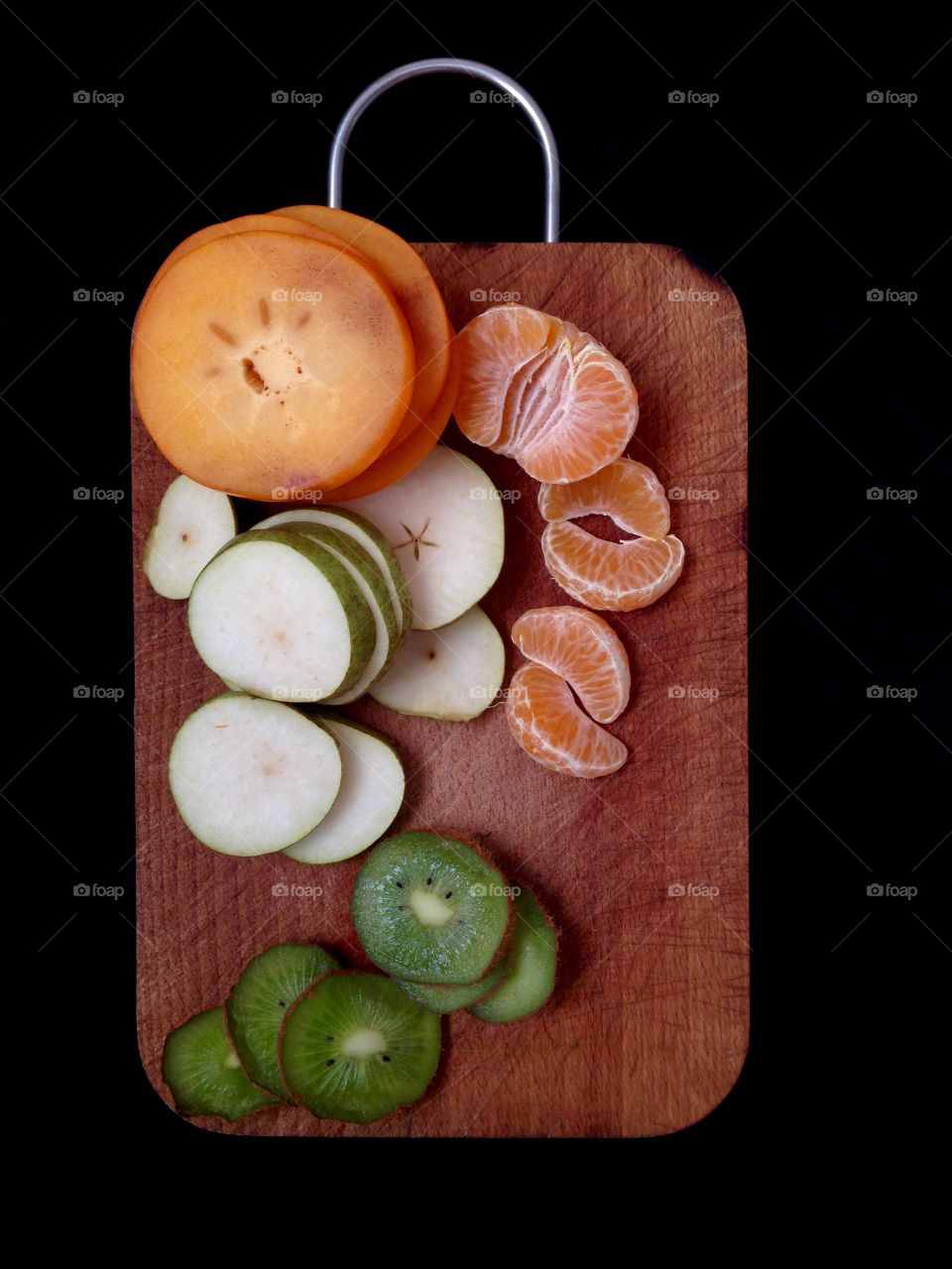 Healthy breakfast from above with a lot of sliced fruits 