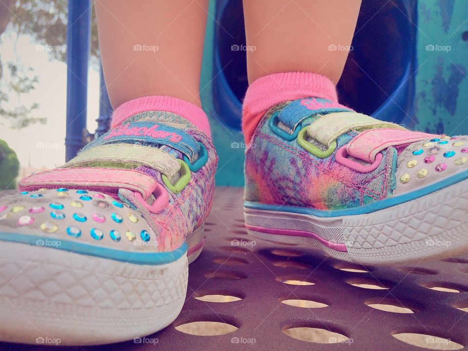 My baby girls shoes. These are my daughter's favorite pair of shoes.   I'm happy to see her run around just to light up her shoes. :D