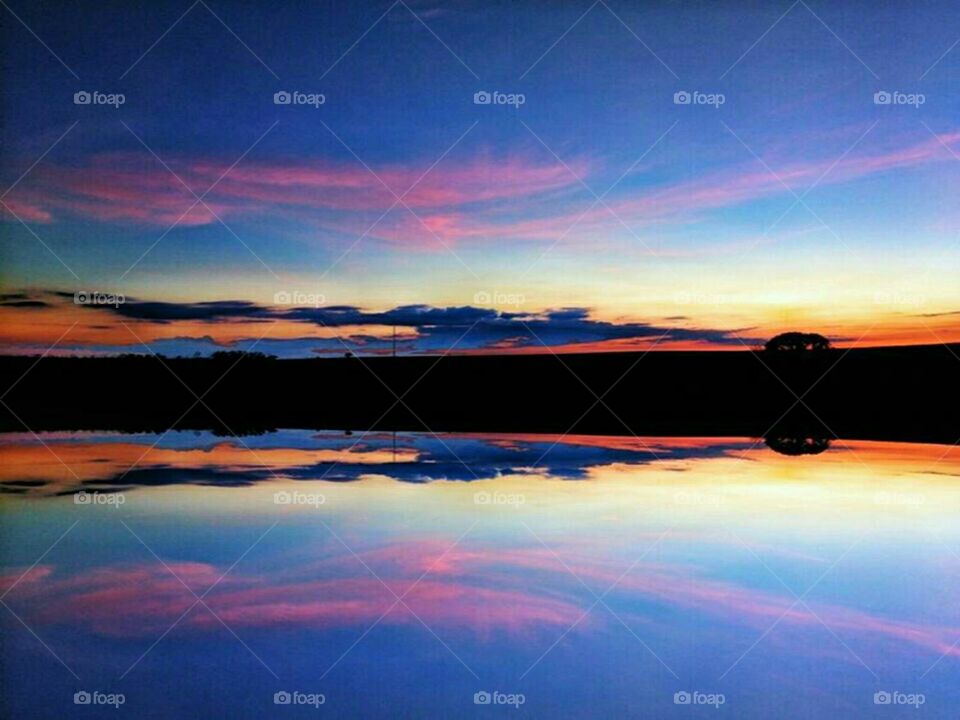 Reflection of dramatic sky in lake