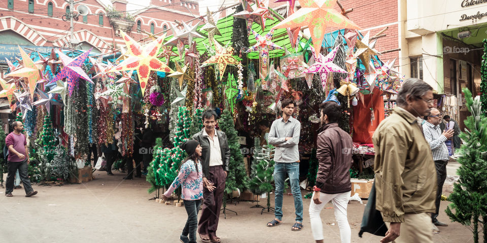 New Market, Kolkata, December 2, 2018: Flea market with of Christmas flowers and trees and toys displayed for customer in Hog g Market also called New Market during Christmas festival.