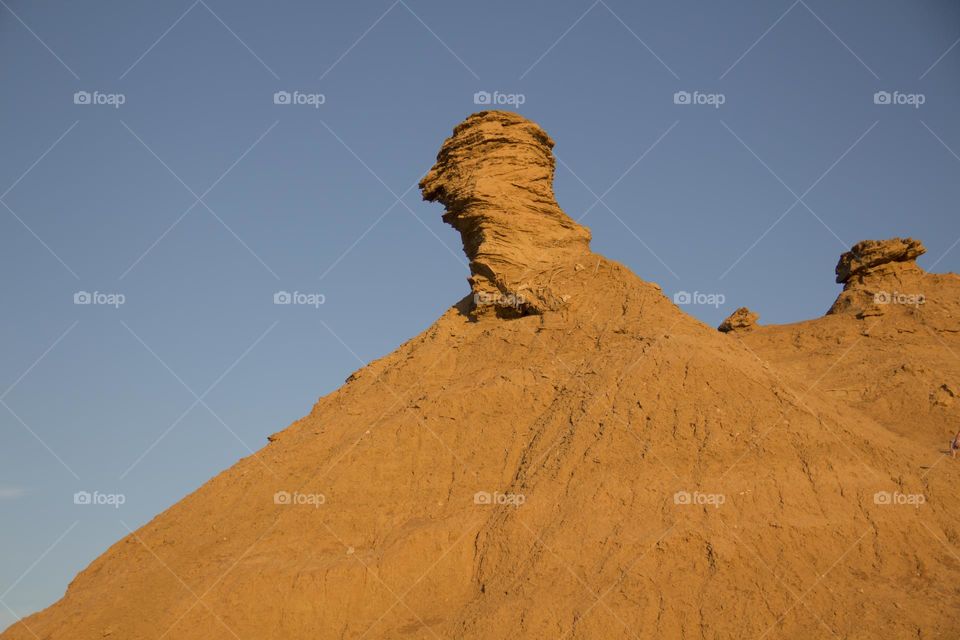 Beautiful mountain in the Sahara desert against the blue sky.