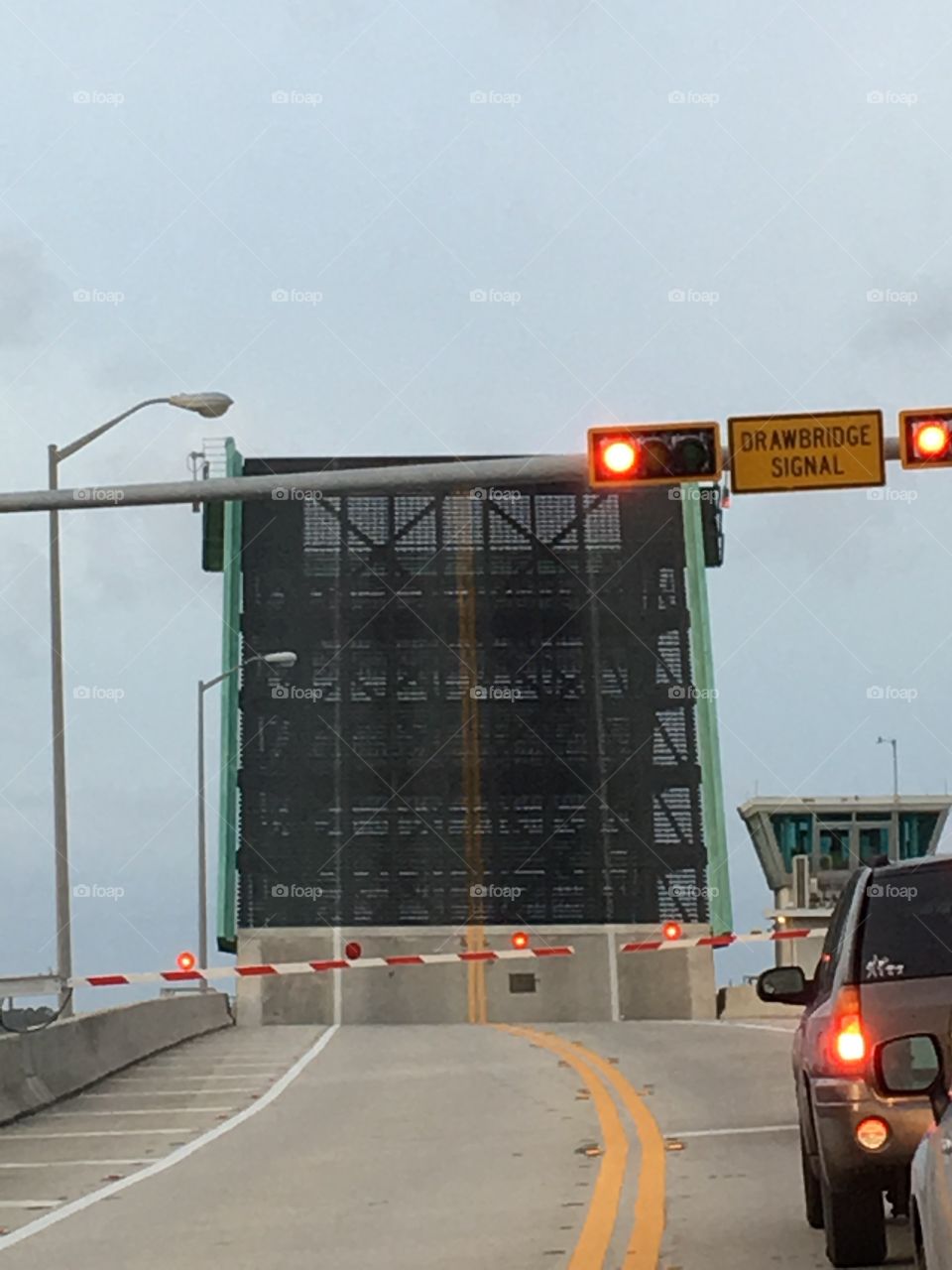 Funny how a simple drawbridge can put a smile on a child's face, just by them listening to the signal and the toot of the boats horn. 