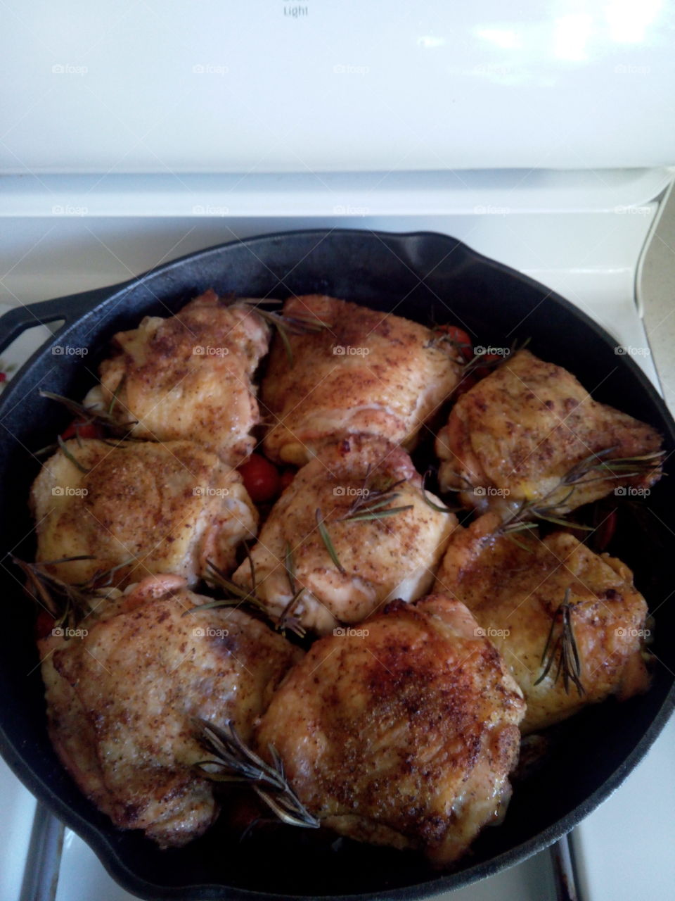 Roasted Rosemary Chicken. Rosemary chicken thighs roasted in a cast iron skillet