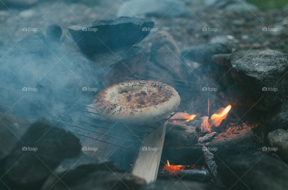 Sausages on the fire