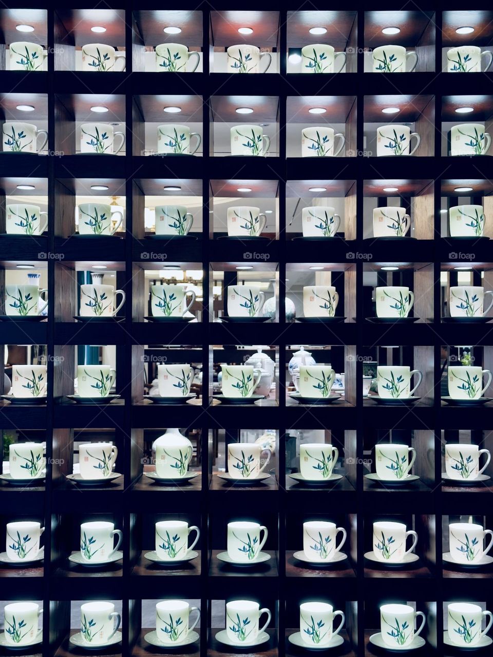 Ceramic cups on the shelf