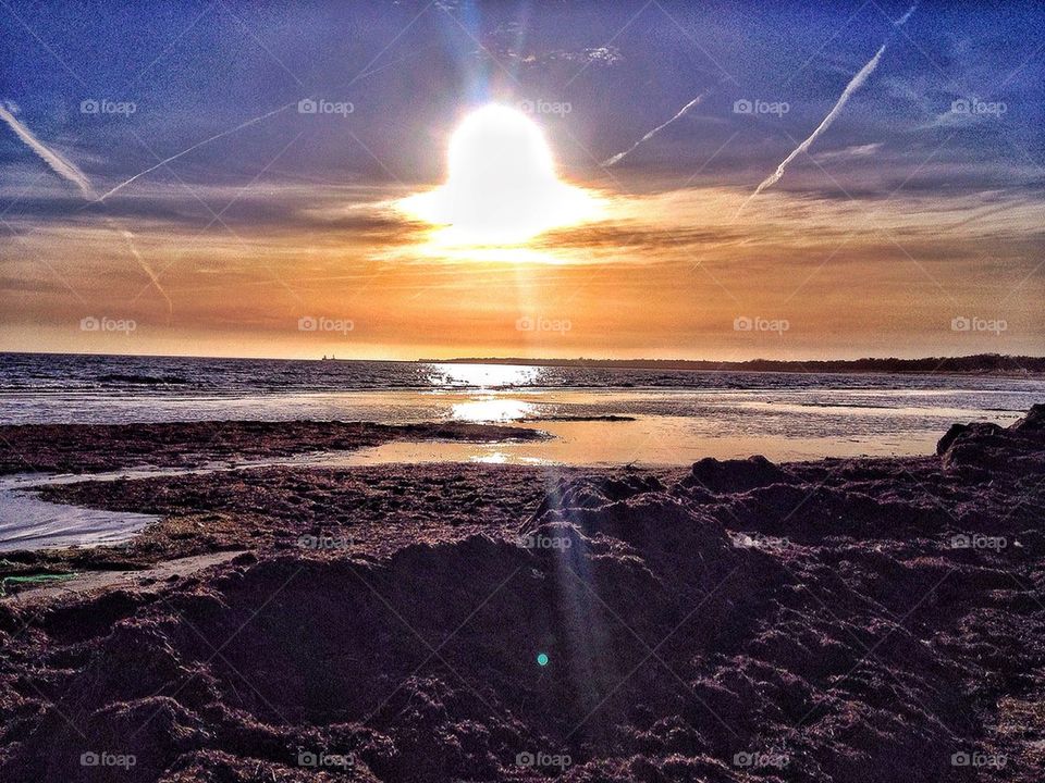 Sunset over Winter beach