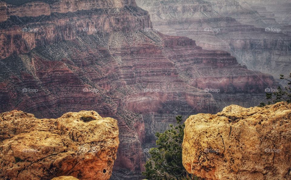 two big rocks, that looks like a gate or way to Grand Canyon trails.