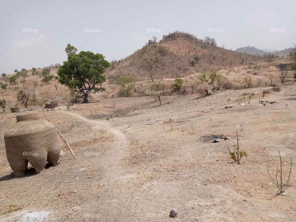 a local barn for grain storage in the land of Layang Wereben of Yorro local government of Taraba State Nigeria. the area is surrounded by mountains.