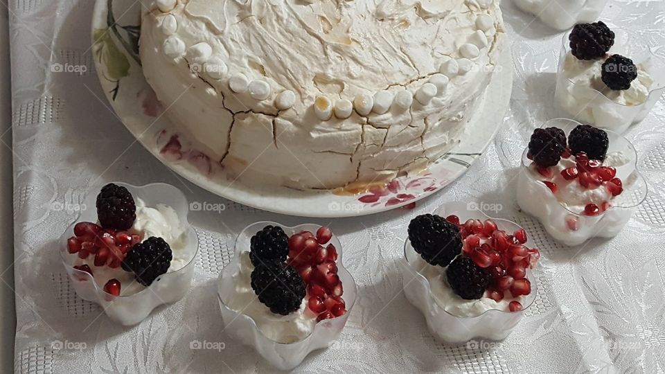 A Pie And Pomegranate With blackberries in Cream