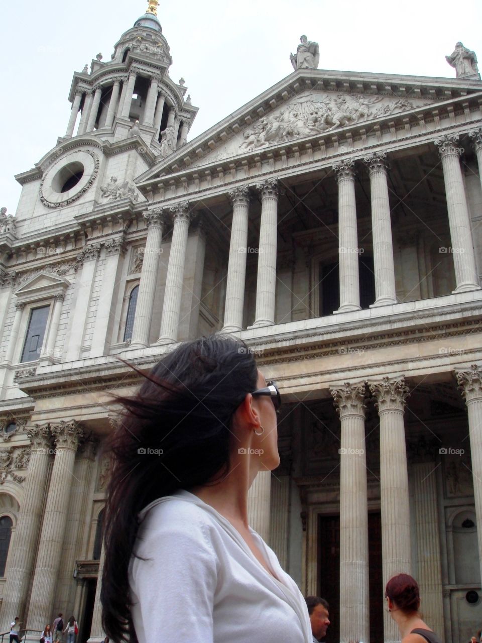 one beautiful woman looking at the cathedral