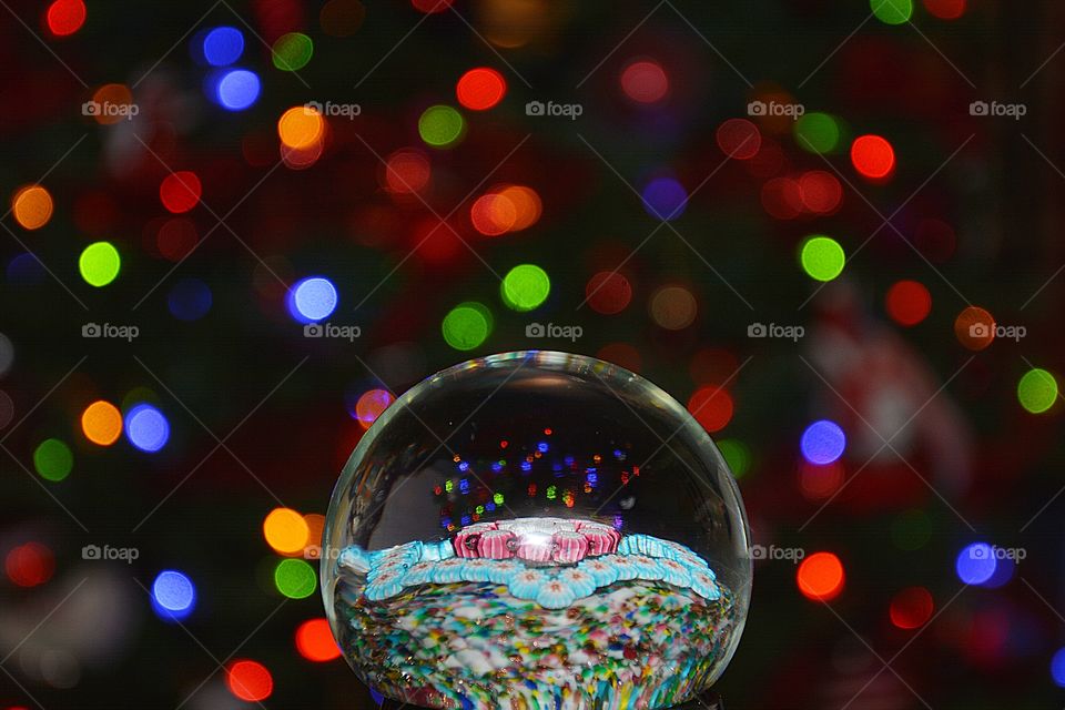 Light: Natural vs artificial - Colorful lights seen through a glass globe 