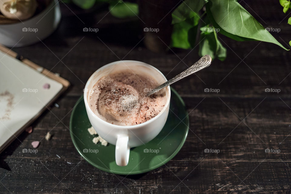 Coffee Cup in saucer on table