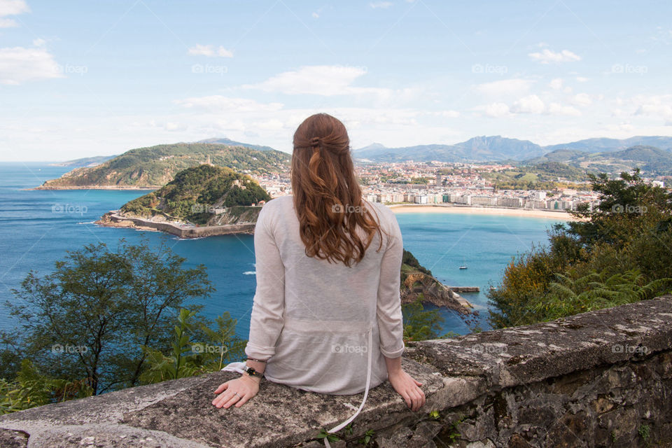 Rear view of a woman looking at view