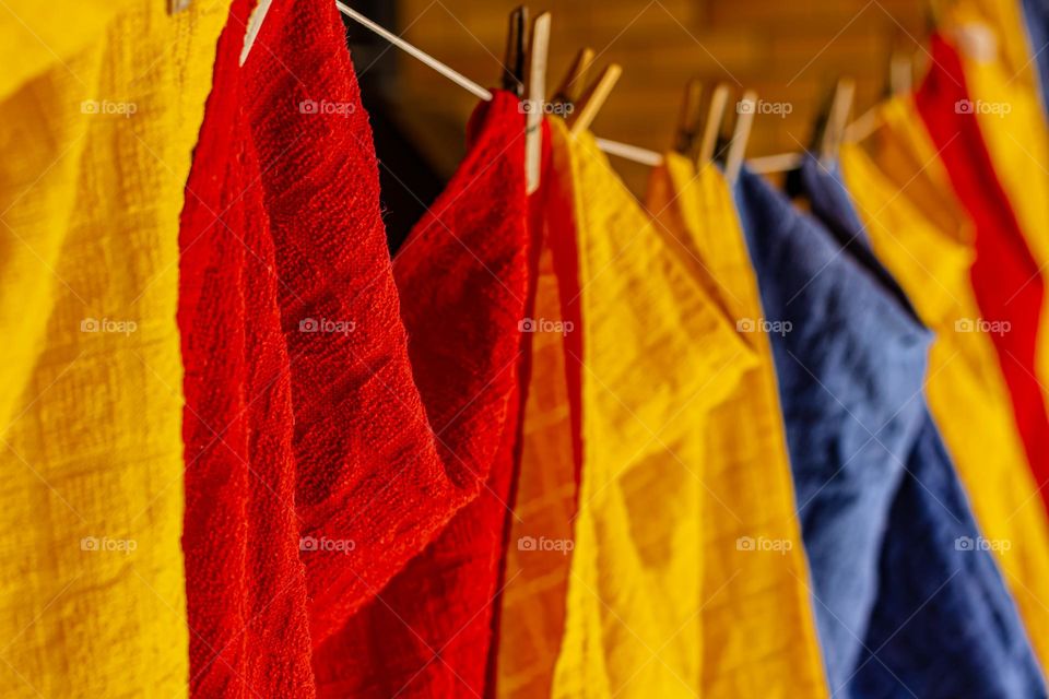 Colorful cloths drying in the wind