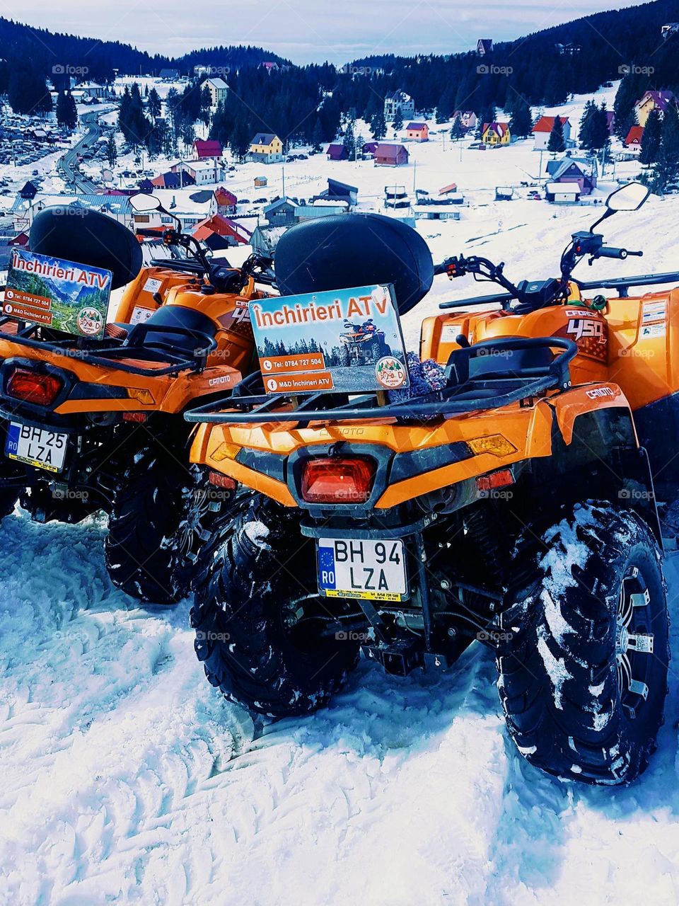 with ATV on the snow