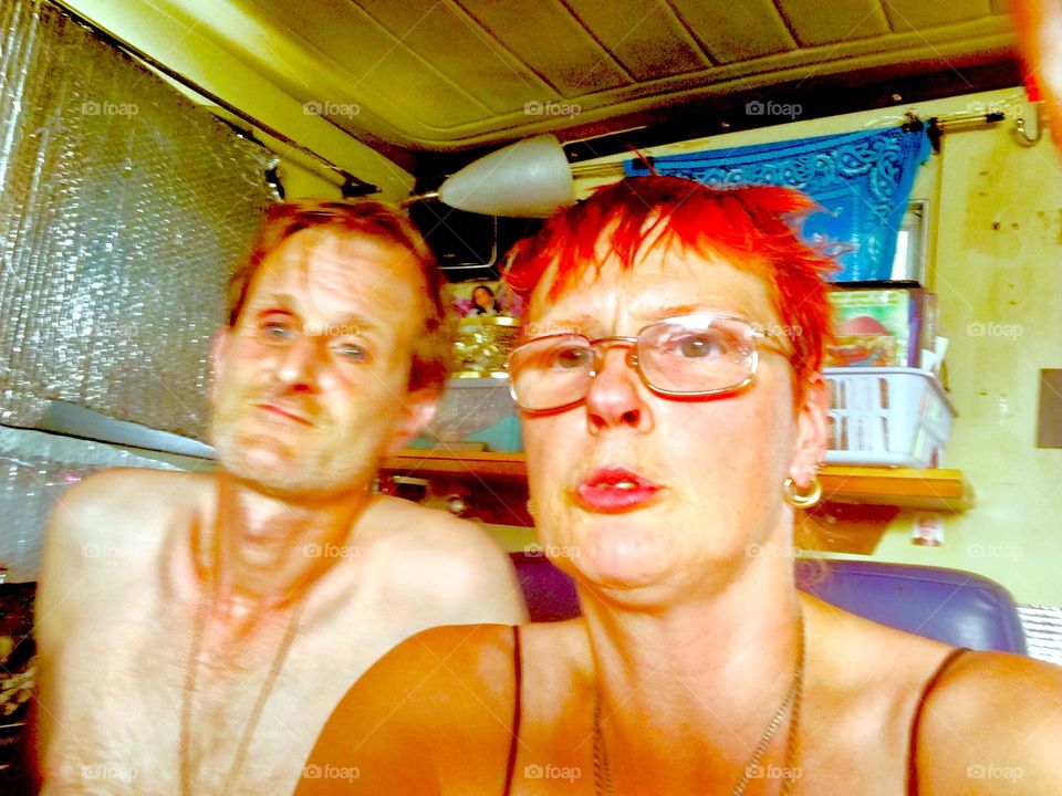 I, “Petra Schiller” and longtime partner “Timothy Trespas” are hanging out aboard our “1969 Luhrs” cabin cruiser, the “Salvation” at “Newtown Creek” in LIC, Queens. 2023. Hypnotic Productions