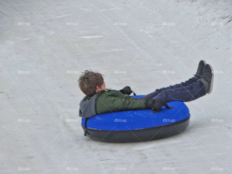 Sledding In The Snow 