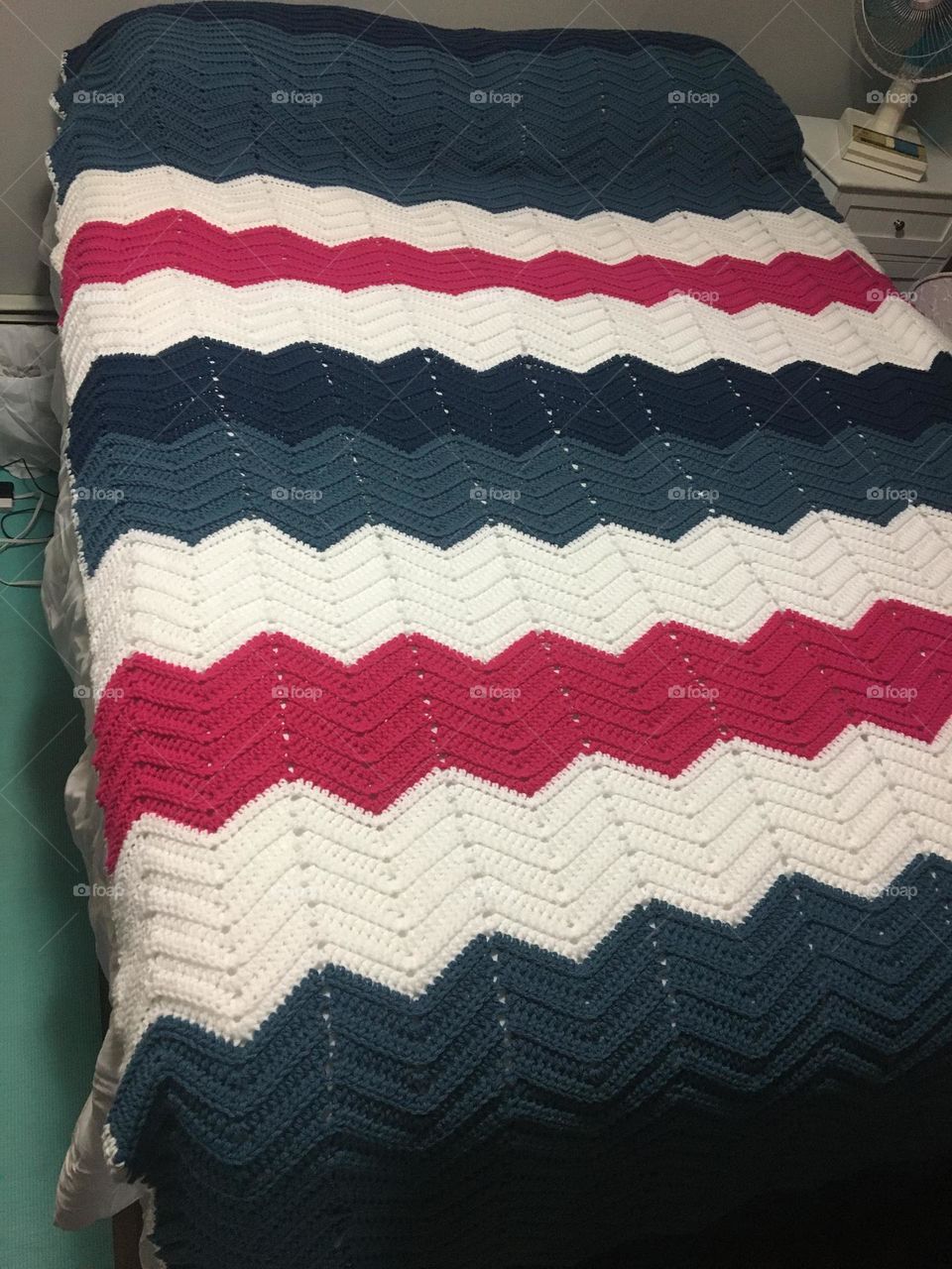 In this mission of green vs white, I chose my handmade crochet blanket/afgan for the very white jagged lines stand out so well against the pink and teal.