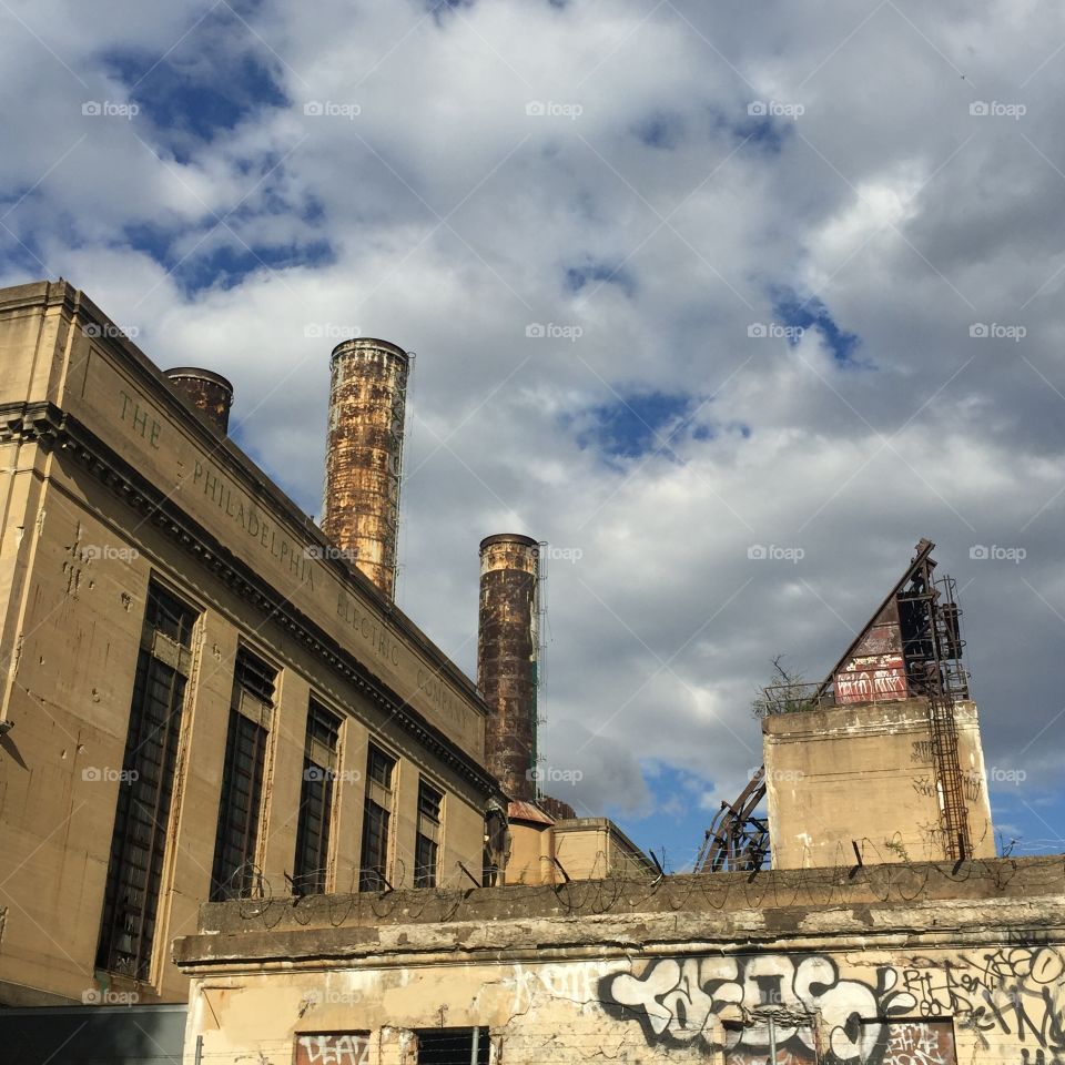 Abandoned Philadelphia electric company building, moody skies 
