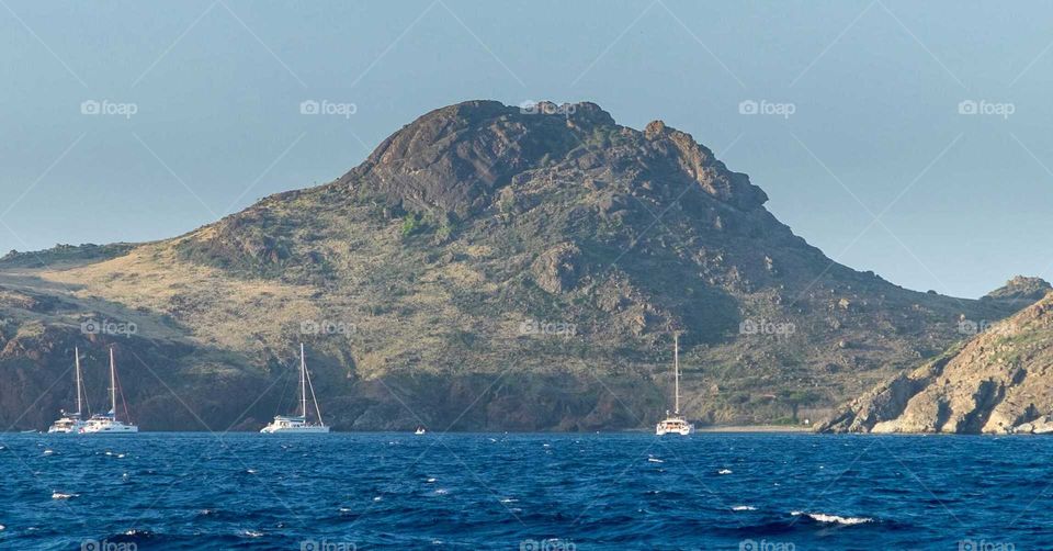 If you go from Saint Martin to Saint Barth by ferry,  you will see small secluded islands in the middle. This place is used by sailboats and yachts owners,  to hang out during the day and enjoy the Caribbean waters and exclusive beaches.  Saint Barth