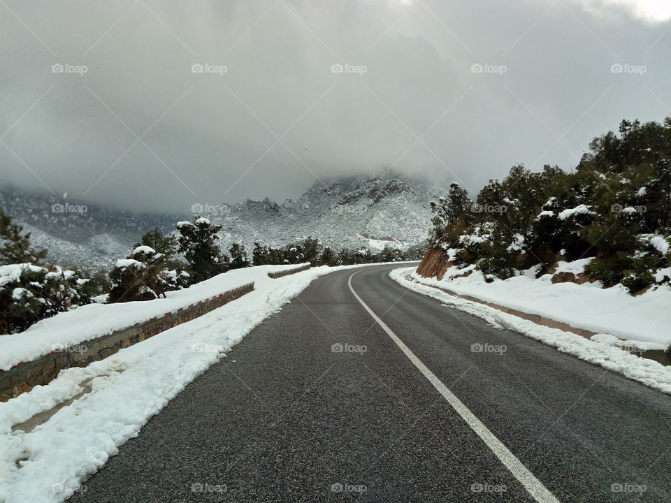 a road that crosses the mountains