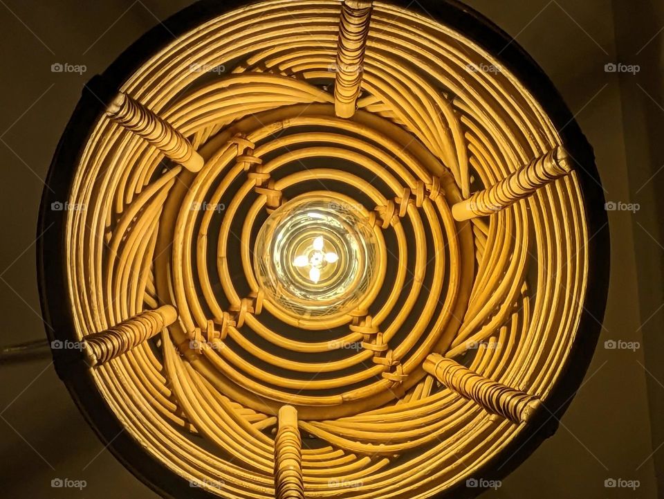 circle rattan lamp shade light fixture view from below circle mission