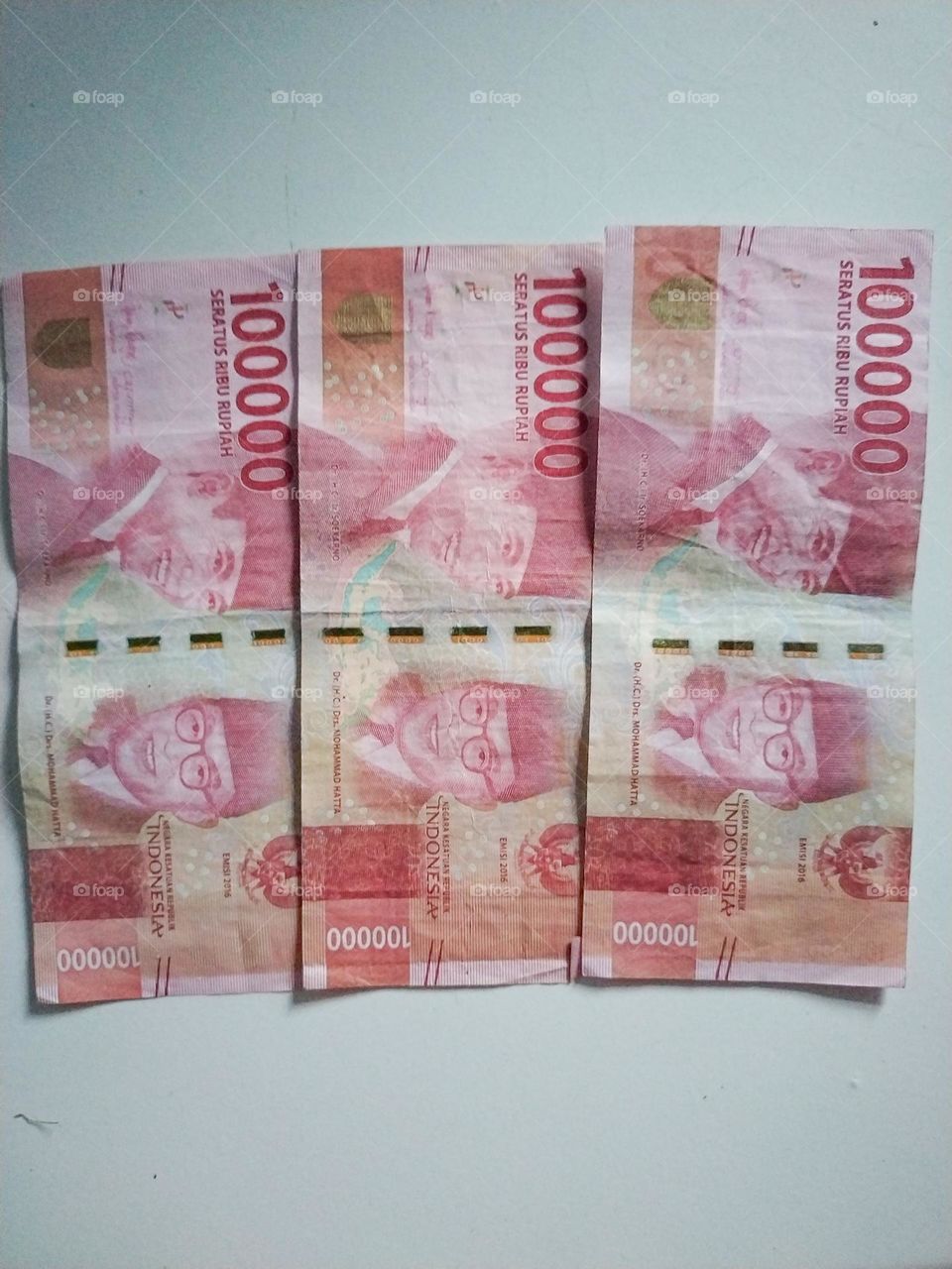 Indonesian currency, one hundred thousand denomination with a total of three sheets