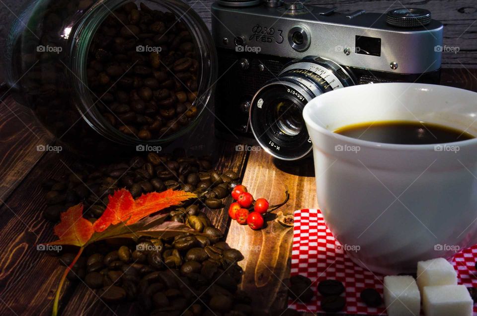 coffee been still life on wooden background