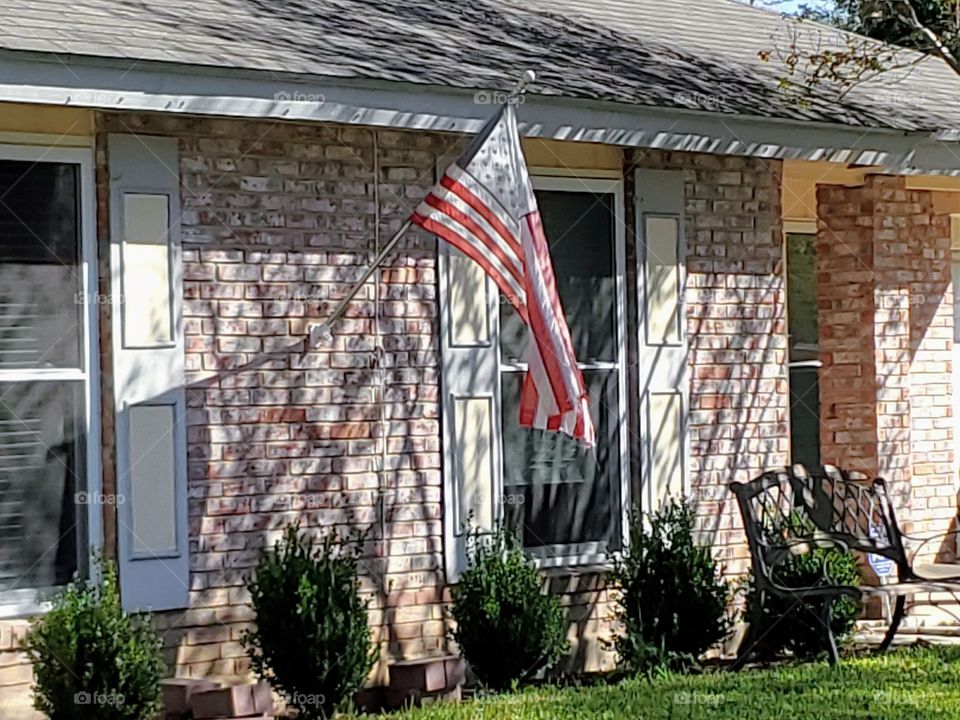 American flag on a residential home